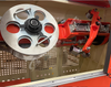 Steel belt armoring machine
